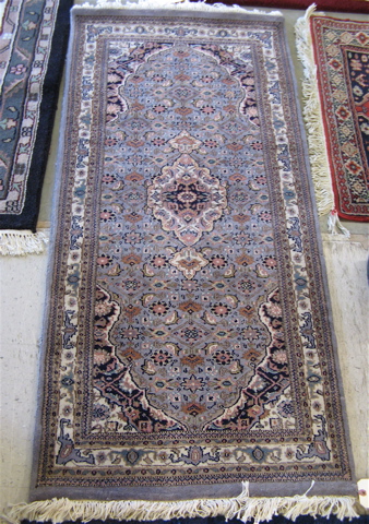 Appraisal: THREE SMALL ORIENTAL AREA RUGS all hand knotted sizes '