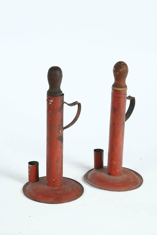 Appraisal: PAIR OF TOLE CANDLESTICKS American nd half- th century Tin