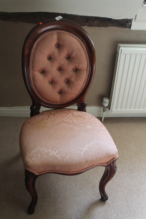 Appraisal: A Victorian mahogany cameo back chair with cabriole legs