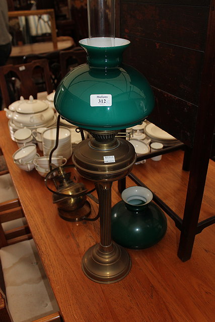 Appraisal: A BRASS OIL LAMP with turquoise glass shade and reeded