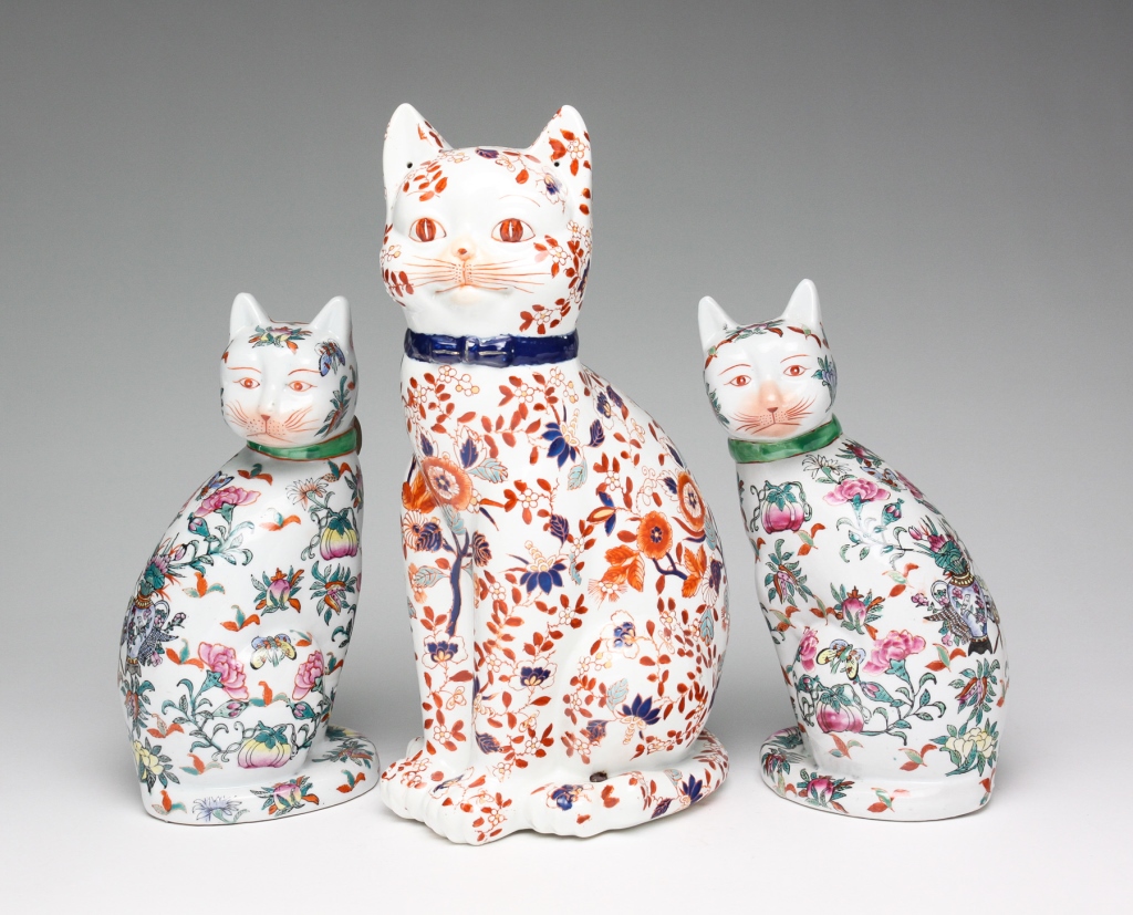 Appraisal: Late th century Seated cats with floral decoration Red marks