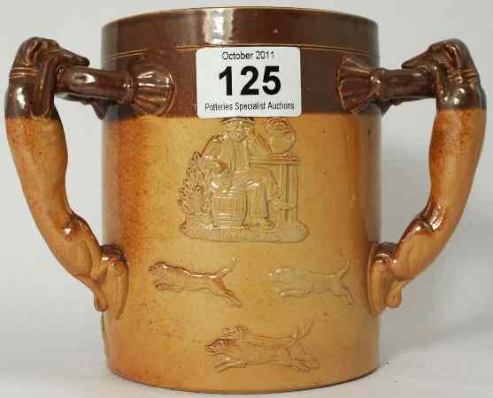 Appraisal: Doulton Lambeth Three Handled Jug with Dogs as handles featuring