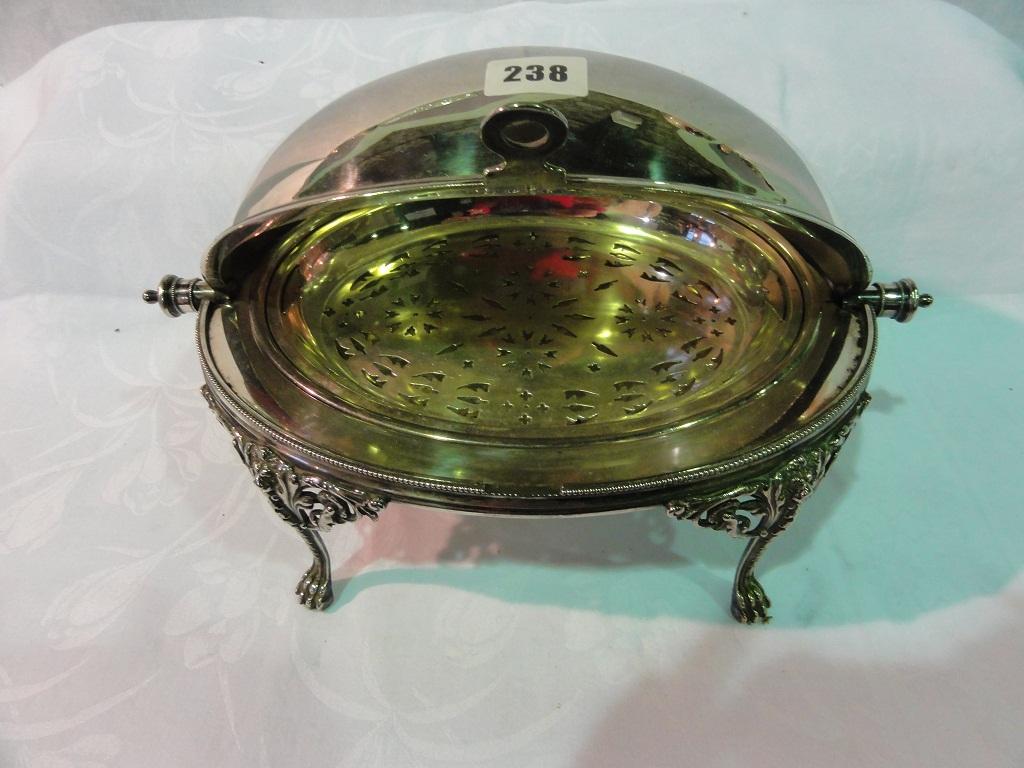 Appraisal: A silver plated Elkington warming dish with usual rising lid