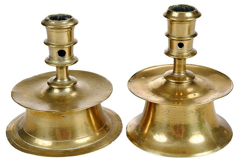 Appraisal: Two North European Brass Capstan Candlesticks probably early th century