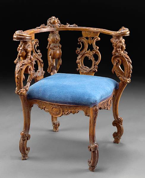 Appraisal: An Austrian Rococo Revival walnut corner chair second half th