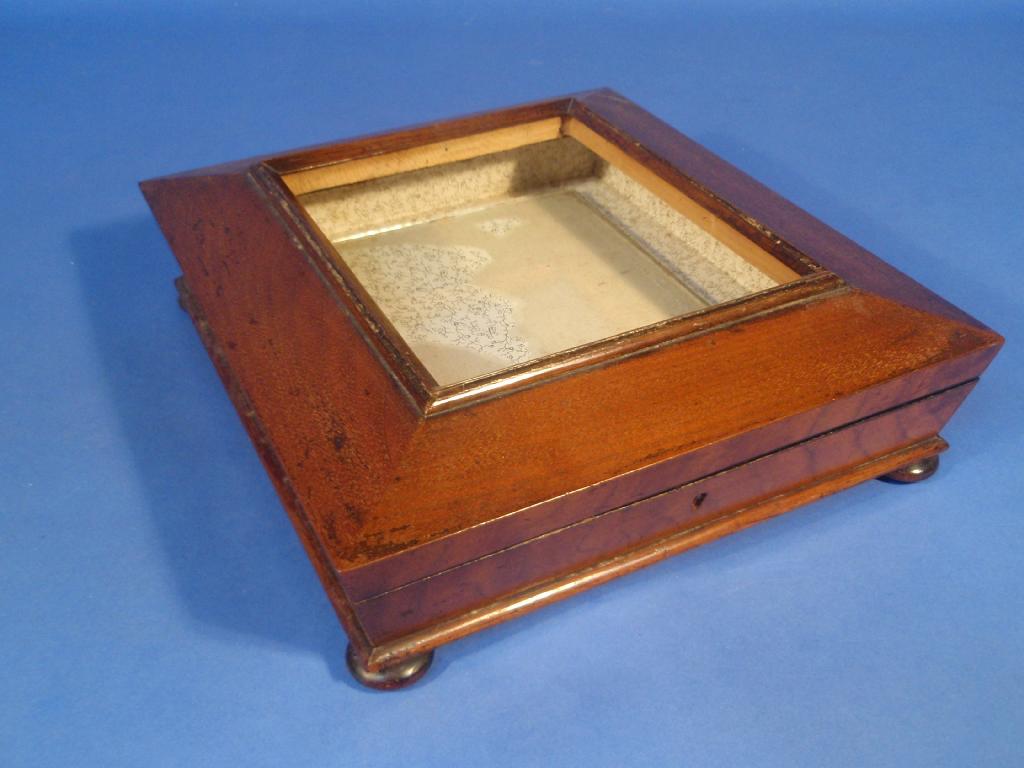 Appraisal: A Victorian mahogany sarcophagus table cabinet