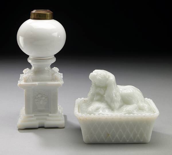 Appraisal: An extremely rare molded opaque white glass spaniel covered box