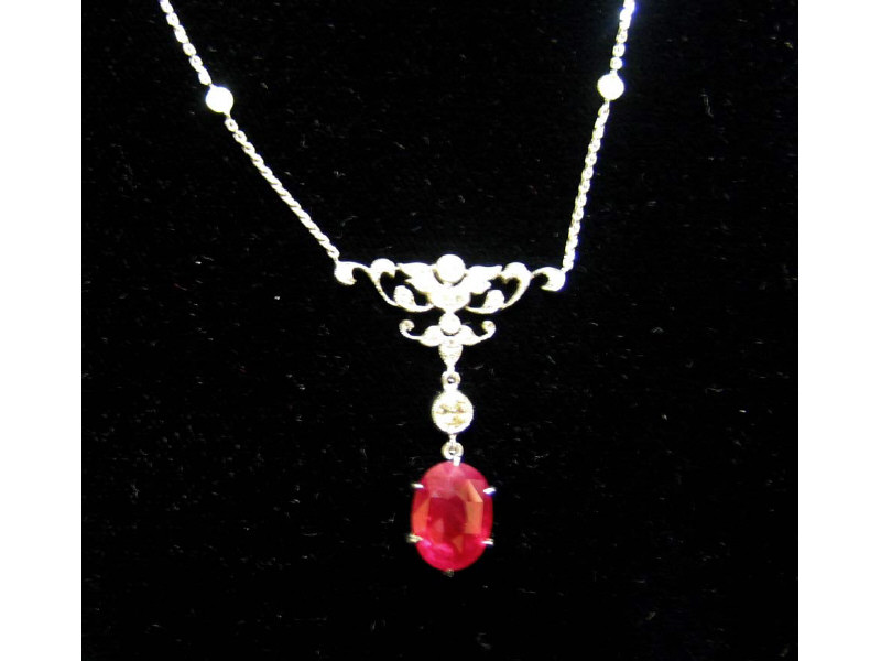 Appraisal: RUBY AND DIAMOND NECKLACE k white gold with dangling oval