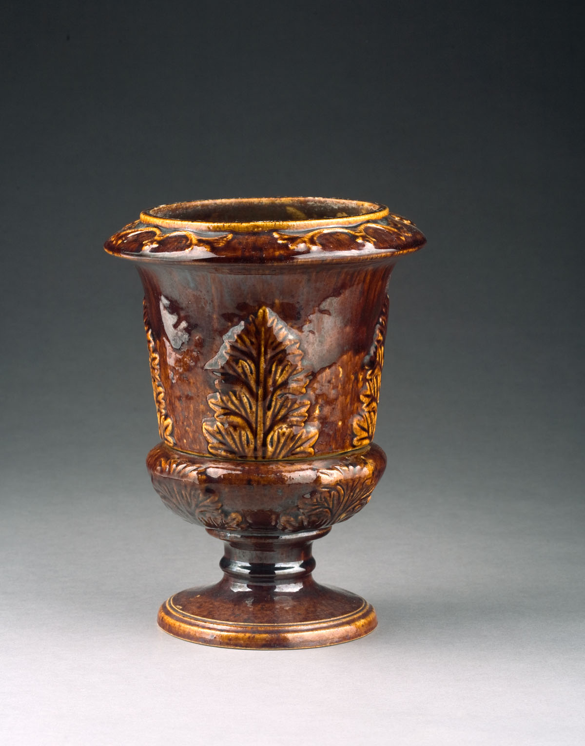 Appraisal: ROCKINGHAM GLAZED TWO-PART FLOWER POT Height inches