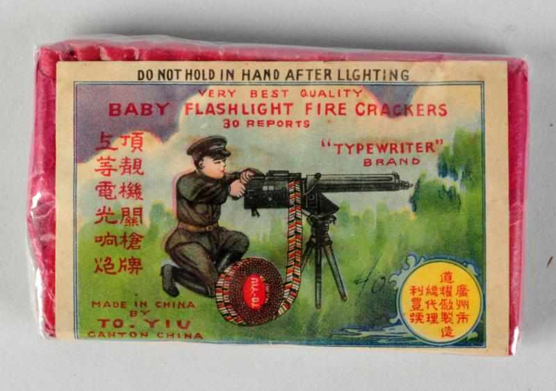 Appraisal: Typewriter -Pack Baby Flashlight Firecrackers Class Manufactured by To-Yiu Condition