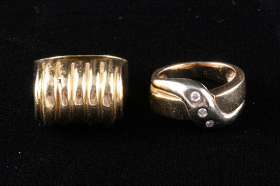 Appraisal: TWO YELLOW GOLD RINGS One K with ribbed cylindrical dome