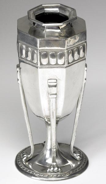 Appraisal: LIBERTY TUDRIC Pewter faceted urn on buttressed feet Stamped TUDRIC