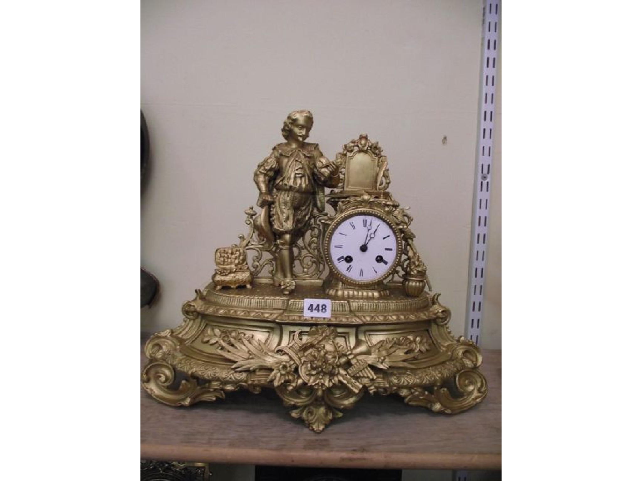 Appraisal: A th century spelter mantel clock the -day striking movement