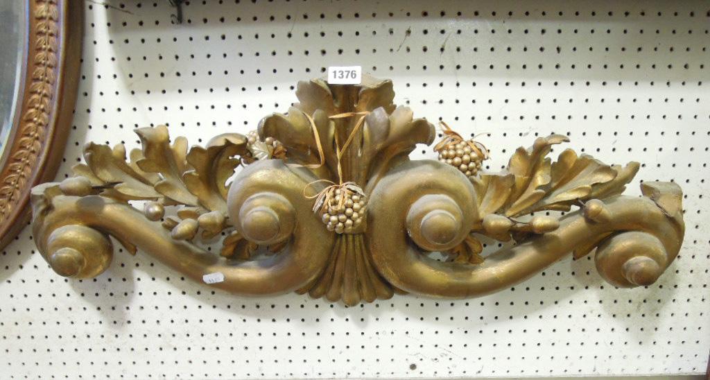 Appraisal: A th century gilded timber pediment with carved oak leaf