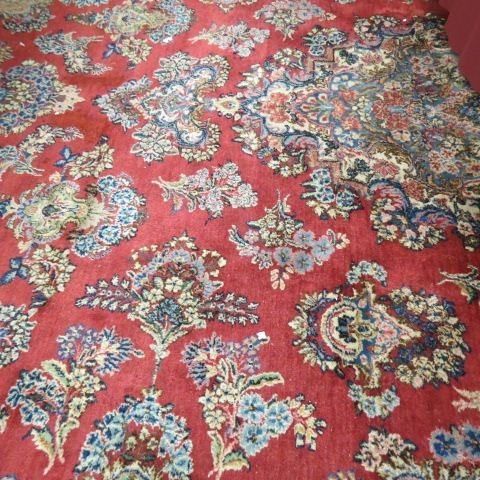 Appraisal: Kerman Persian Handmade Room Size Rug elaborate floral red field