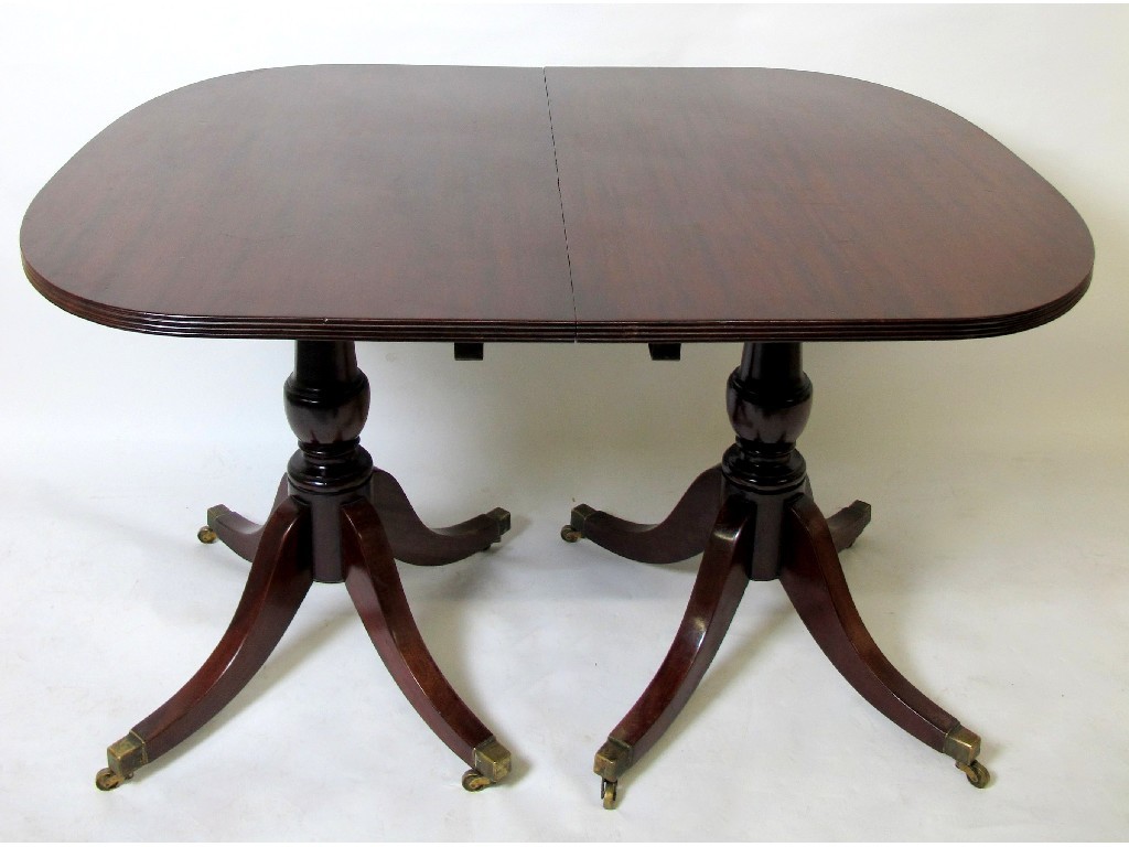 Appraisal: A mahogany twin pedestal dining table in the Regency style