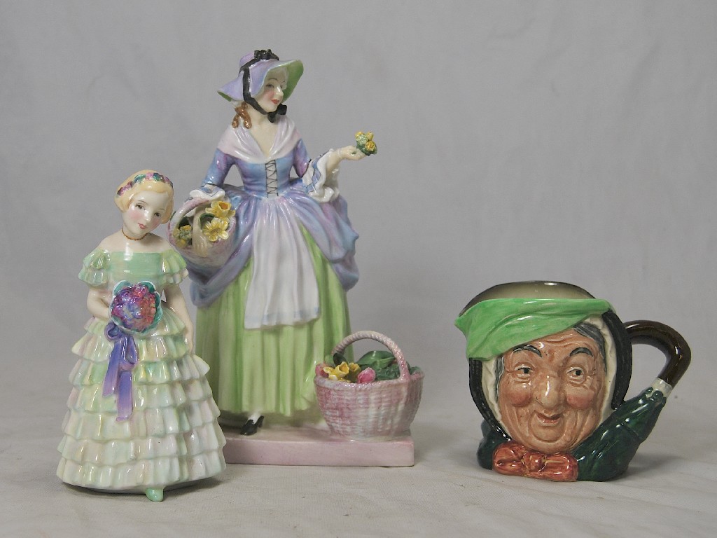 Appraisal: Two Royal Doulton figures 'Spring Flowers' HN and 'The Little