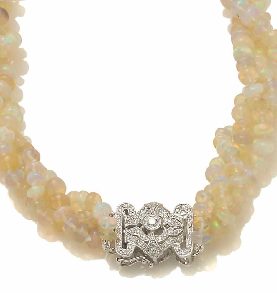 Appraisal: An opal bead and diamond triple-strand necklace gradated opal beads