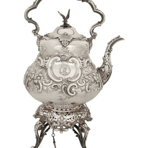 Appraisal: A Sheffield Silver-Plate Hot Water Kettle and Stand Circa Overall