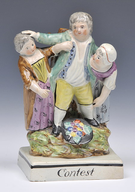 Appraisal: A STAFFORDSHIRE SQUARE BASED FIGURE 'CONTEST' circa cm