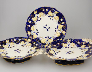 Appraisal: Victorian dessert service blue gilt foliate pattern comprising thirteen plates