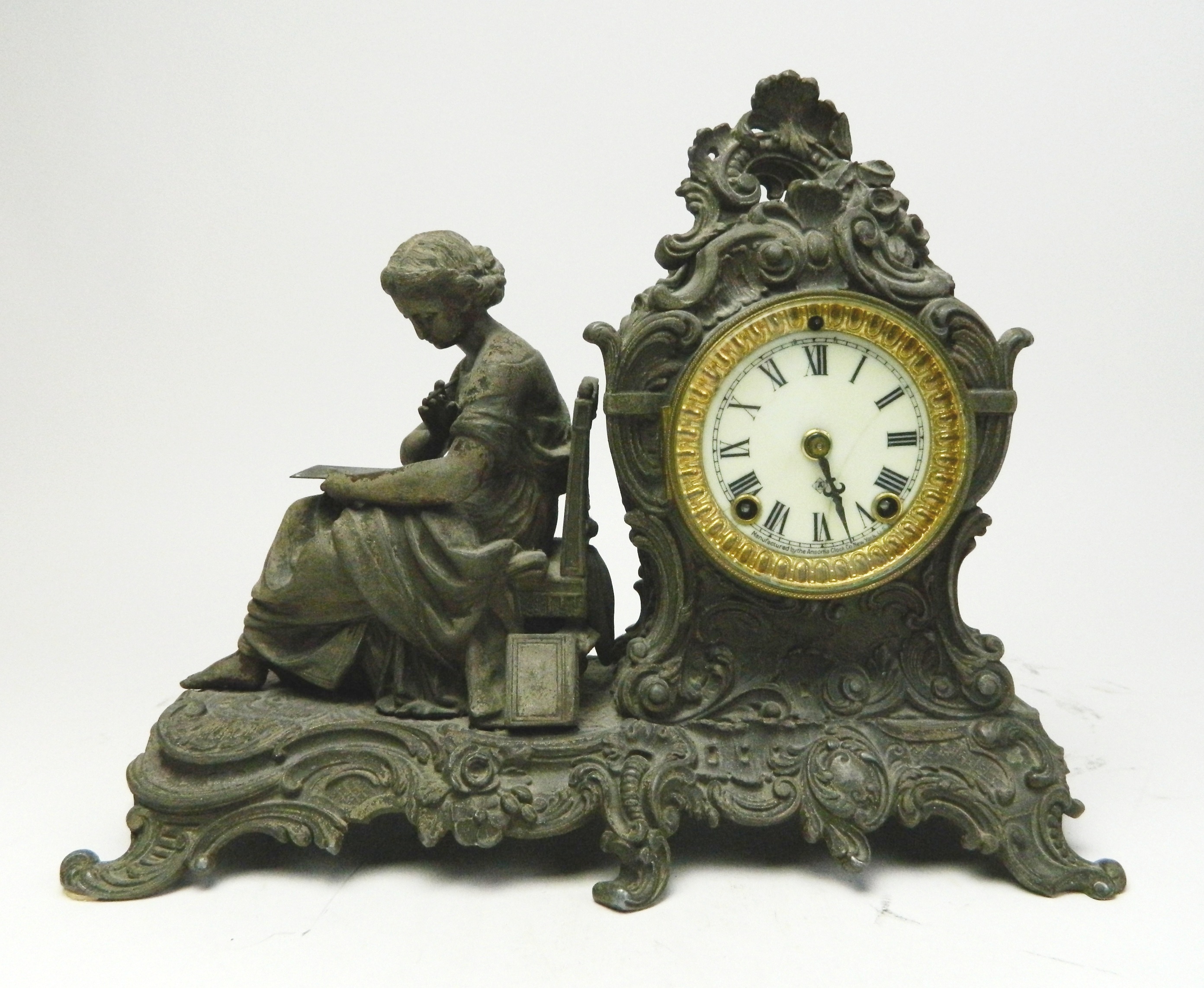 Appraisal: Ansonia Figural Mantle Clock French rococo style filigree decorated case