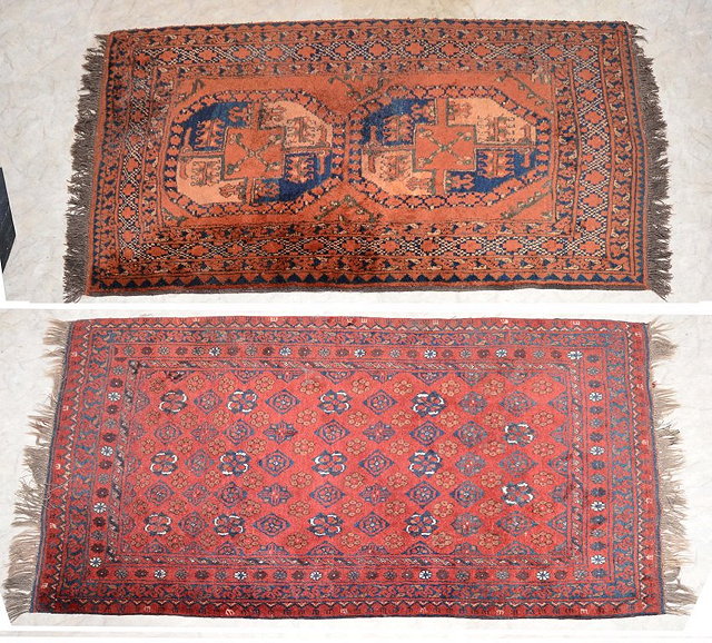 Appraisal: TWO PAKISTAN WOOL RUGS one of red ground with geometric