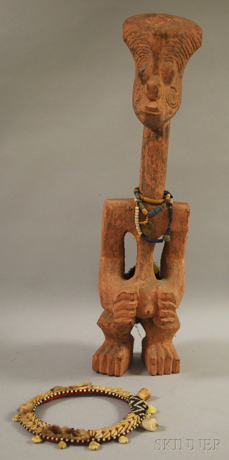 Appraisal: African Carved Wood Figure with Beaded and Shell Collar and