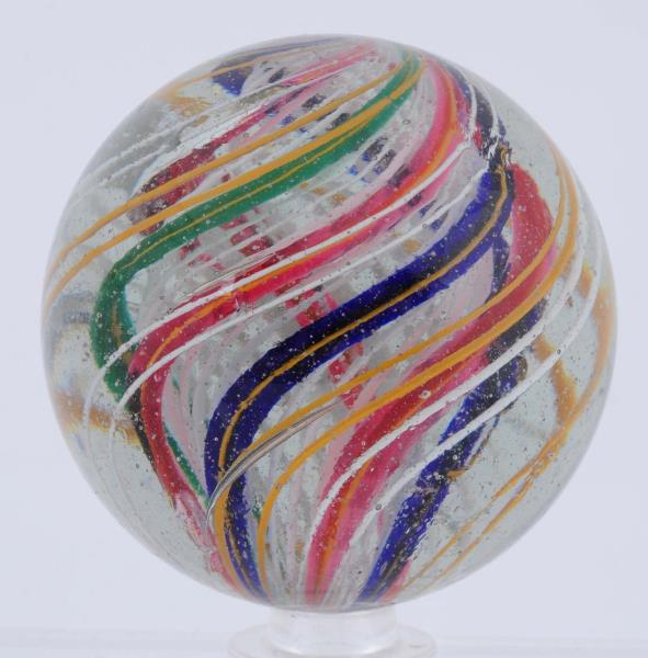 Appraisal: Large -Stage Latticino Swirl Marble White latticino core surrounded by