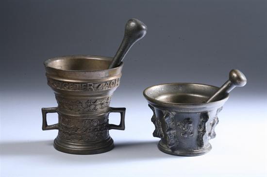 Appraisal: TWO CONTINENTAL BRONZE MORTARS AND PESTLES th century One cast