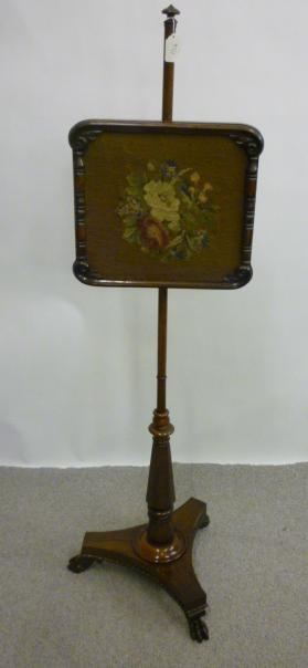 Appraisal: A VICTORIAN ROSEWOOD POLE SCREEN the oblong gros point floral