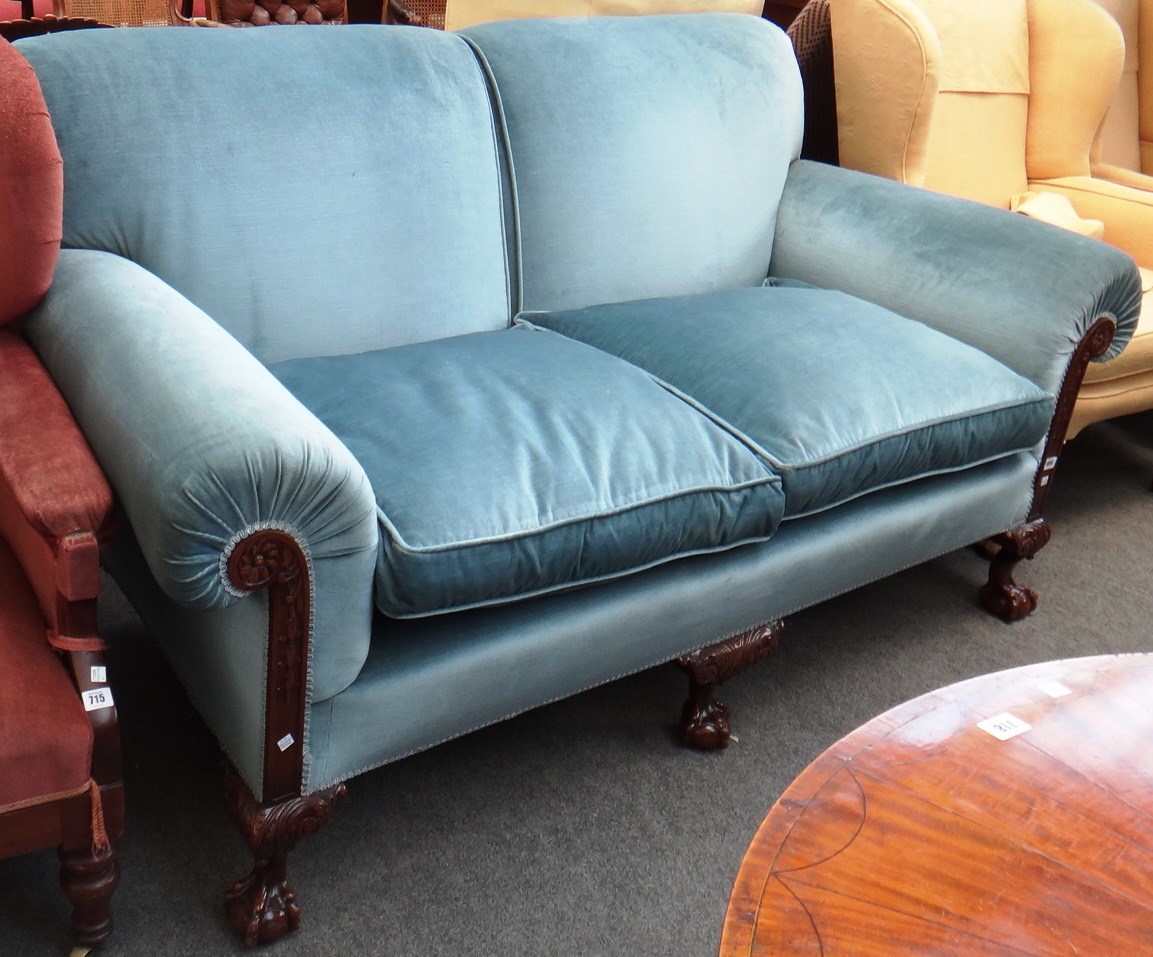 Appraisal: A George II design sofa with rollover back and arms