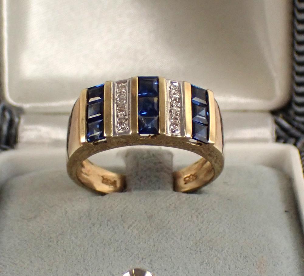 Appraisal: SAPPHIRE DIAMOND AND FOURTEEN KARAT GOLD RING set with nine