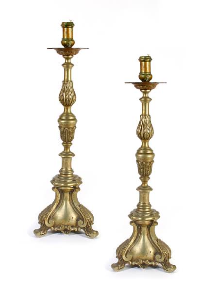 Appraisal: A pair of Baroque style gilt metal candlesticks height in