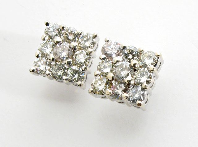 Appraisal: PAIR OF DIAMOND AND FOURTEEN KARAT WHITE GOLD EARRINGS each