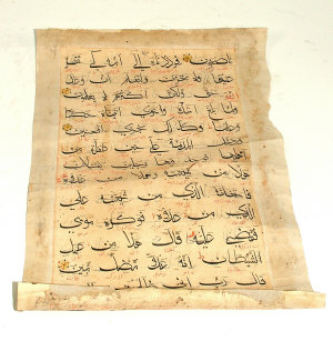 Appraisal: A manuscript leaf from the Koran written in Bahari script