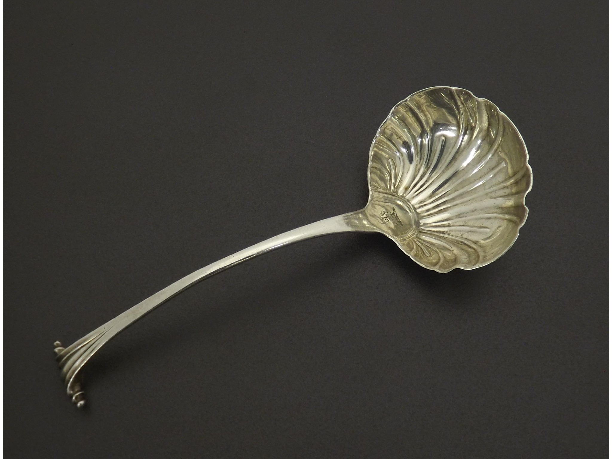 Appraisal: th century 'Onslow' pattern silver ladle maker George Baskerville fluted