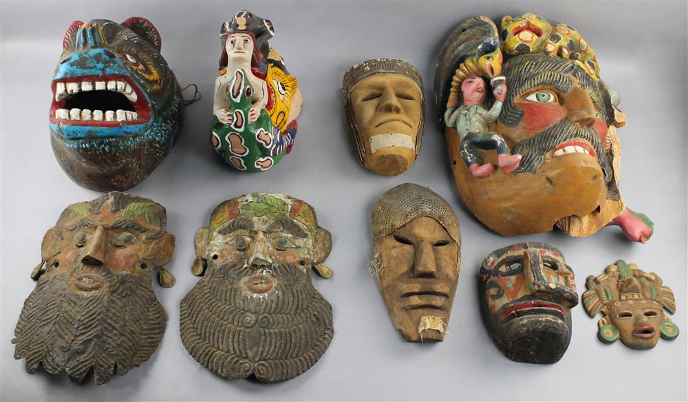 Appraisal: COLLECTION OF MEXICAN MASKS of painted wood papier mache and