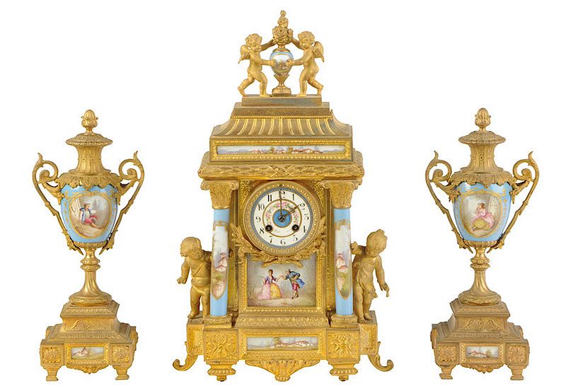 Appraisal: French Gilt Metal and Porcelain Clock Garniture th century clock