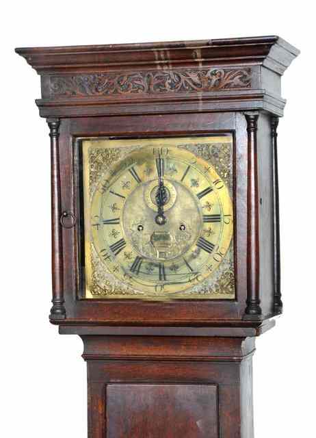 Appraisal: A GEORGIAN MAHOGANY LONGCASE CLOCK enclosing brass dial with second