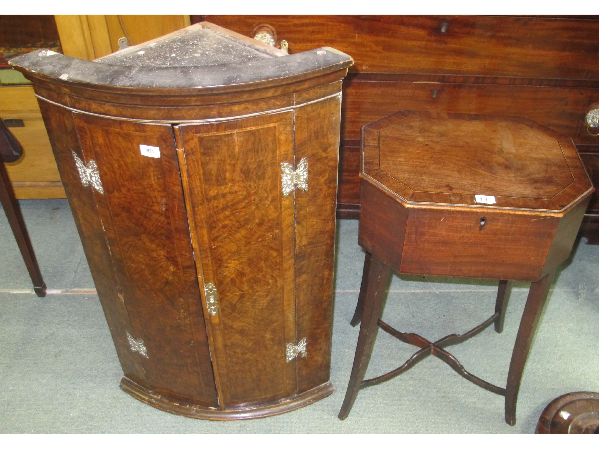 Appraisal: A walnut wall hanging corner cupboard and sewing box