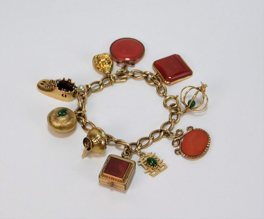 Appraisal: K Gold Ruby Sapphire Hardstone Charm Bracelet China th Century