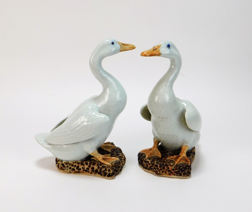 Appraisal: PR CHINESE EXPORT PORCELAIN MARRIAGE DUCK STATUES China Early th