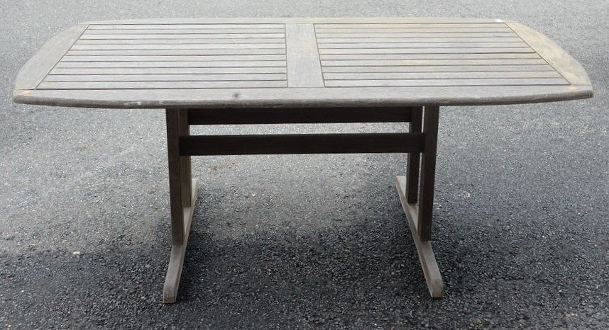 Appraisal: Teak Outdoor Table having trestle base height inches top x