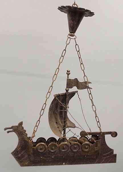 Appraisal: Hanging Arts Crafts hammered iron Viking ship c x