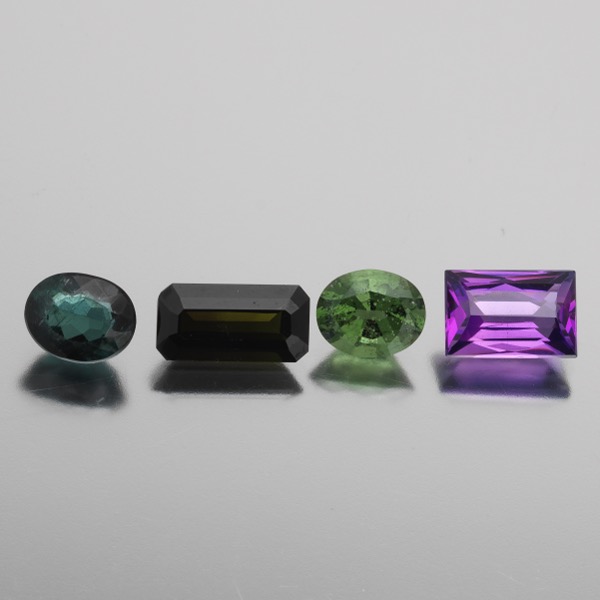 Appraisal: FOUR UNMOUNTED CT TOTAL MULTICOLOR TOURMALINE GEMSTONES Four unmounted multicolor