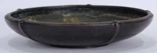 Appraisal: Patinated bronze footed low bowl in the Japanese taste having