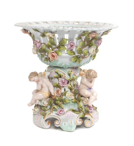 Appraisal: Sale Lot A Continental Porcelain Figural Centerpiece with reticulated top