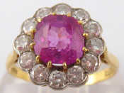 Appraisal: An carat gold ruby and diamond ring the cushion shape