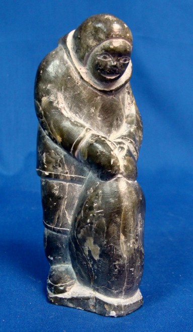 Appraisal: ist th century MAN WITH STONE Soapstone H inches